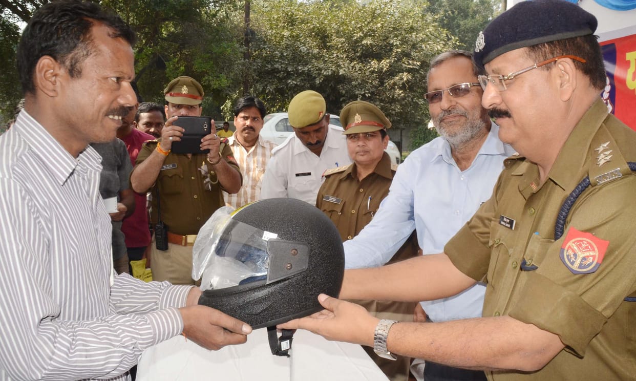 Police distributed bike helmets to riders 
