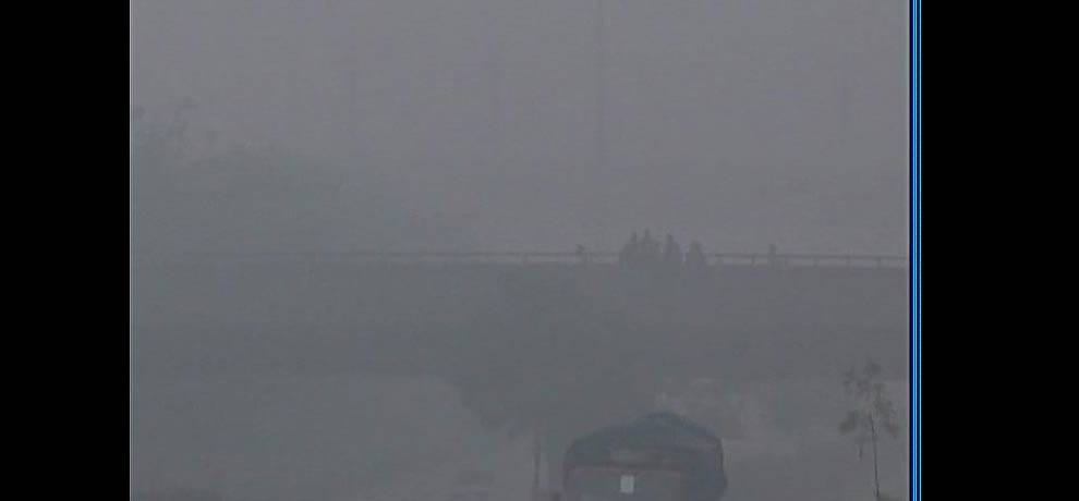 City surrounded by mist, breathing difficult