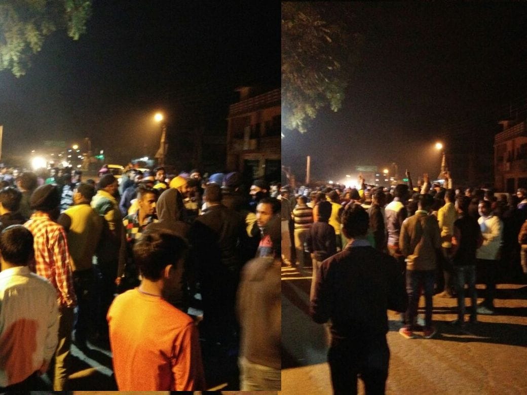 two policemen attached to line on insult of turban.