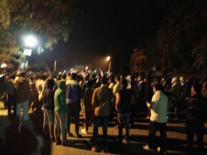 two policemen attached to line on insult of turban.