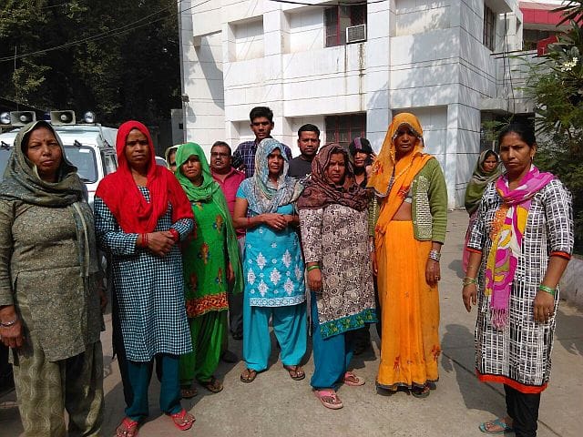 Selling illegal liquor troubled women police cordon office
