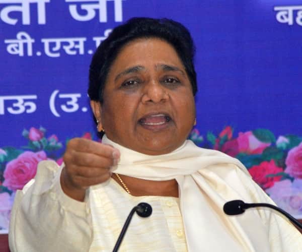 mayawati says PM modi is trying to blackmail people.
