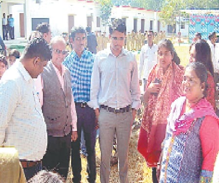 IAS tranies with villagers