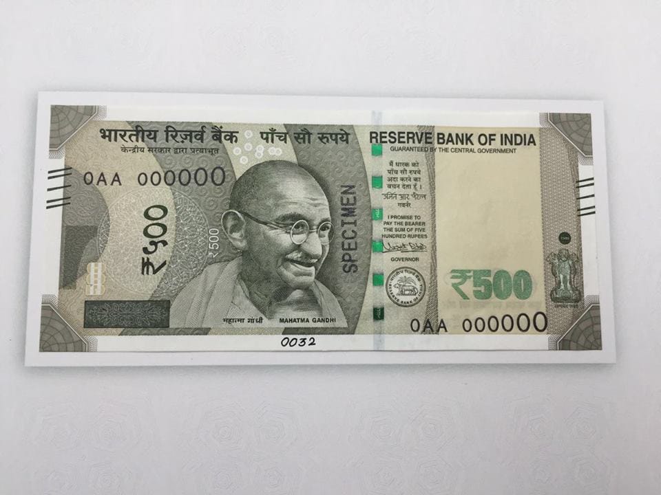 People just out of reach of the 500 notes