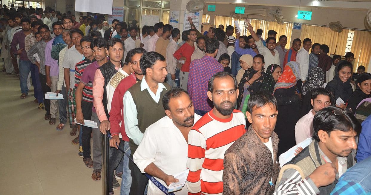 The line of people started up road from counter.