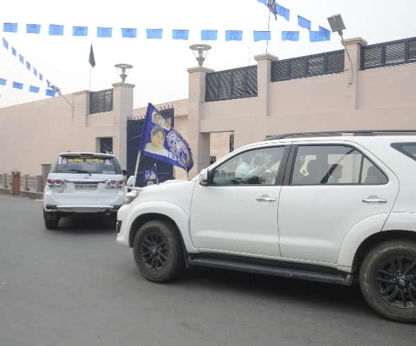 BSP leaders reach office with bags and briefcase.