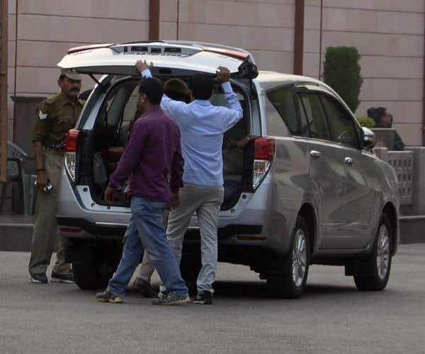 BSP leaders reach office with bags and briefcase.