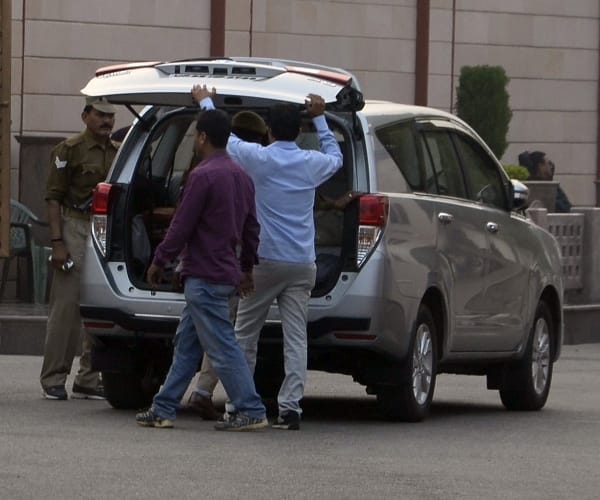 BSP leaders reach office with bags and briefcase.