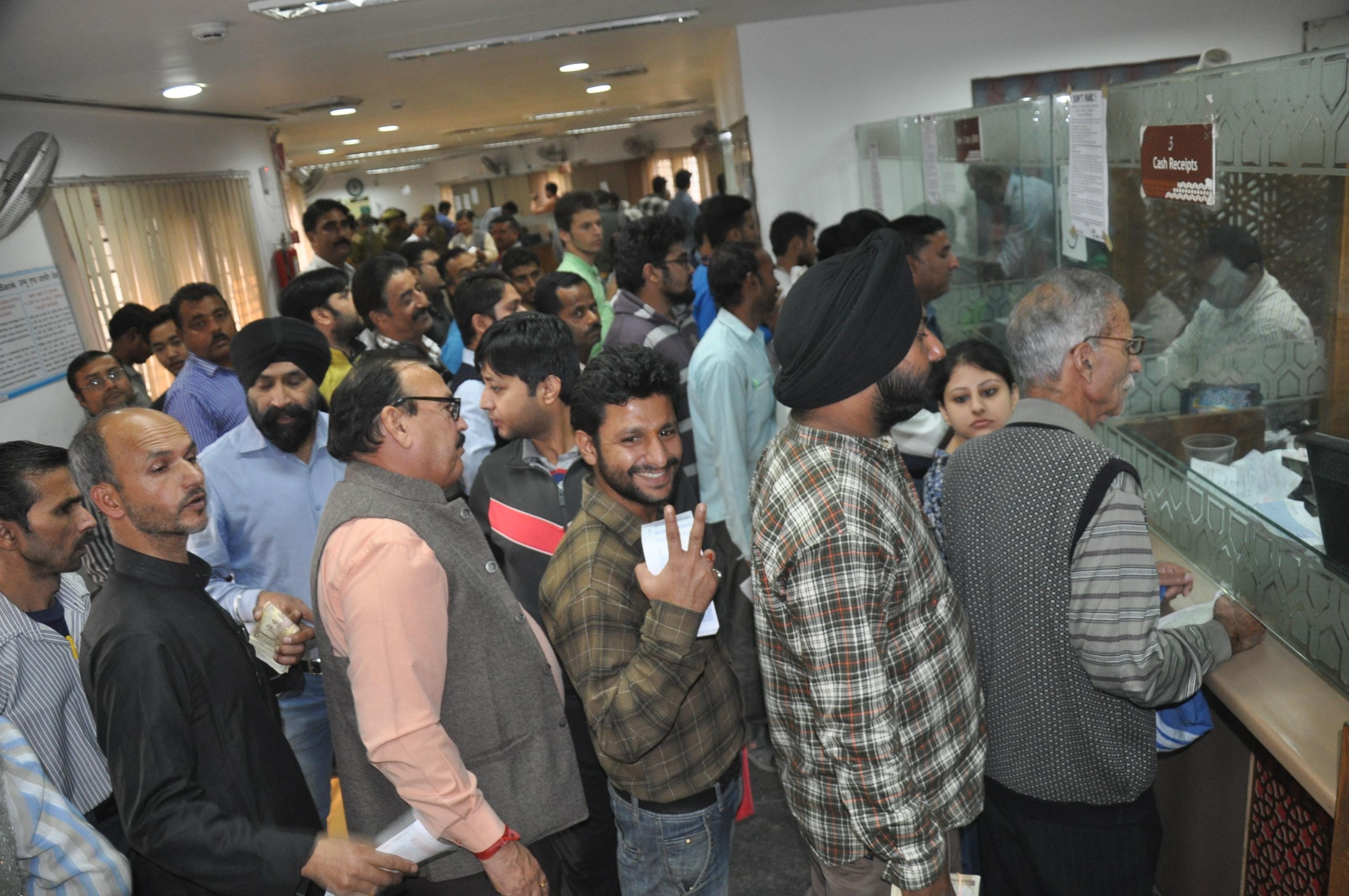 PEOPLE AWAITED A LOT JUST FOR MONEY WITHDRAWL FROM BANK