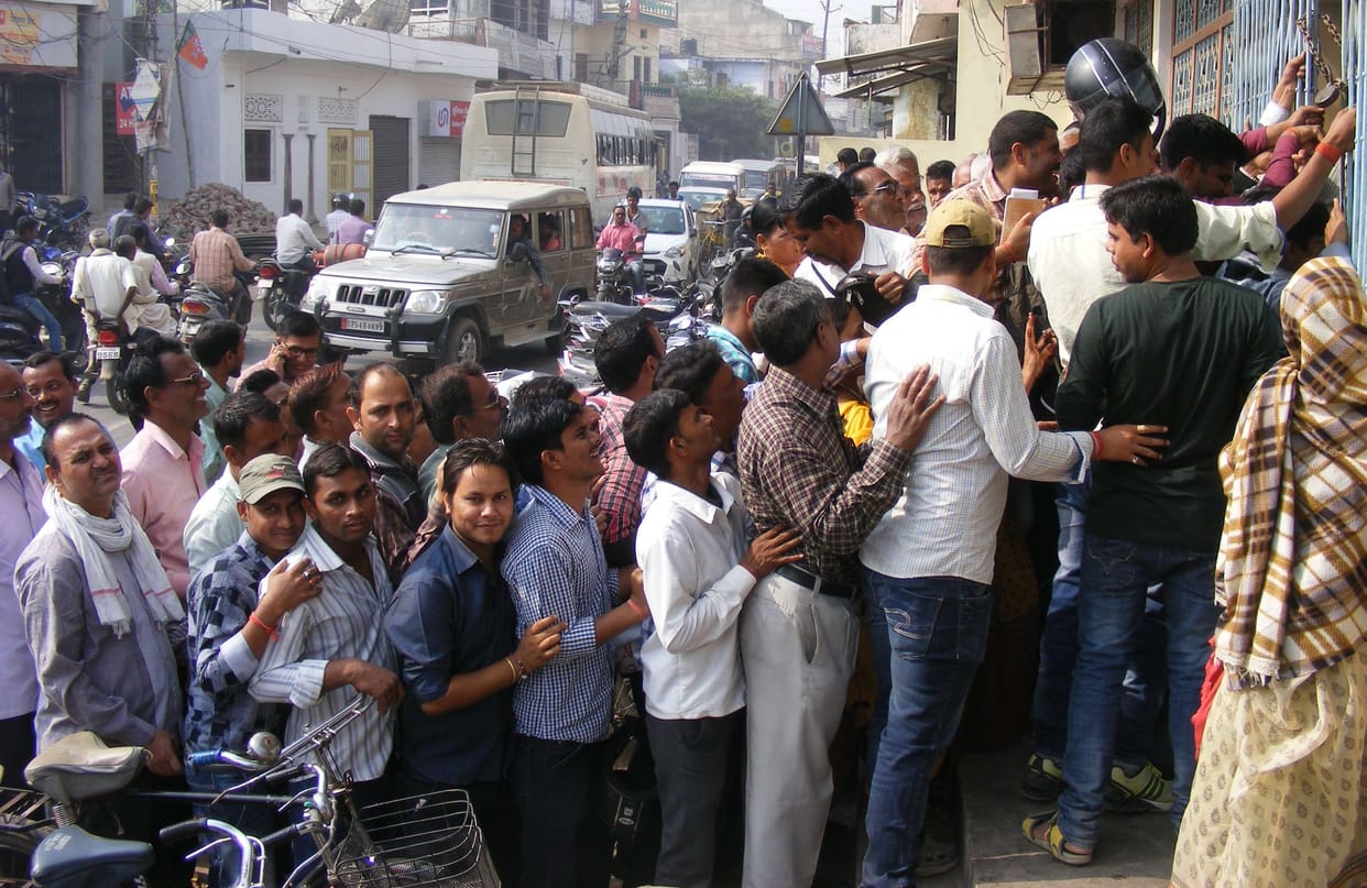 People descended into banks to change large notes
