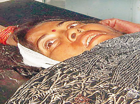 Stepson cut ax, wife injured