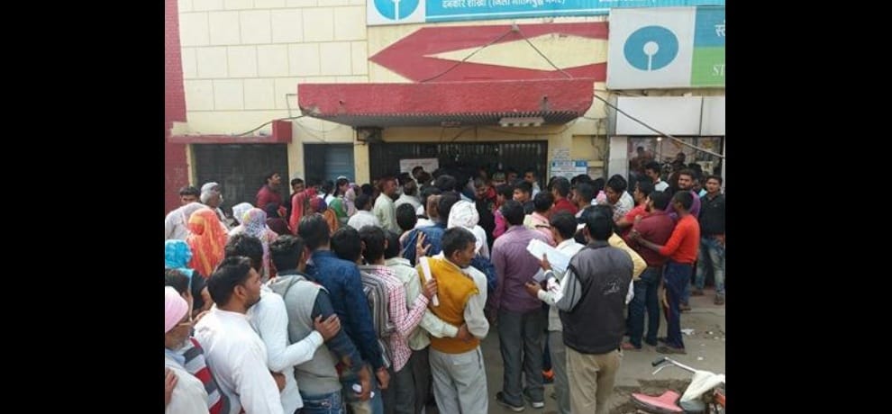 Serpentine queues outside a bank in Delhi ncr area