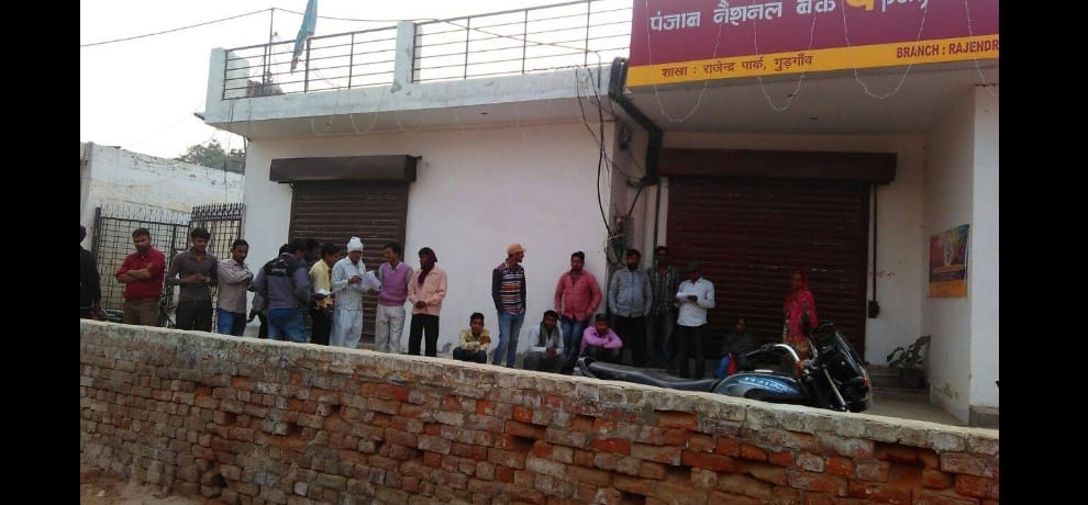 Serpentine queues outside a bank in Delhi ncr area