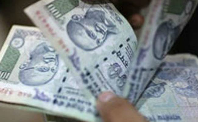 government official insists on bribe in rs 100 notes arrested 