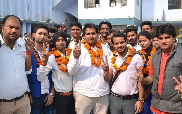 Student elections bugle playing with an enrollment of