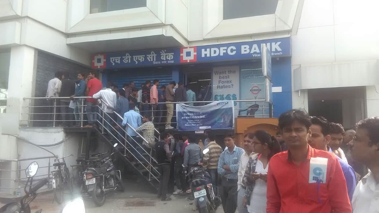 long queue opposite banks for currency exchange