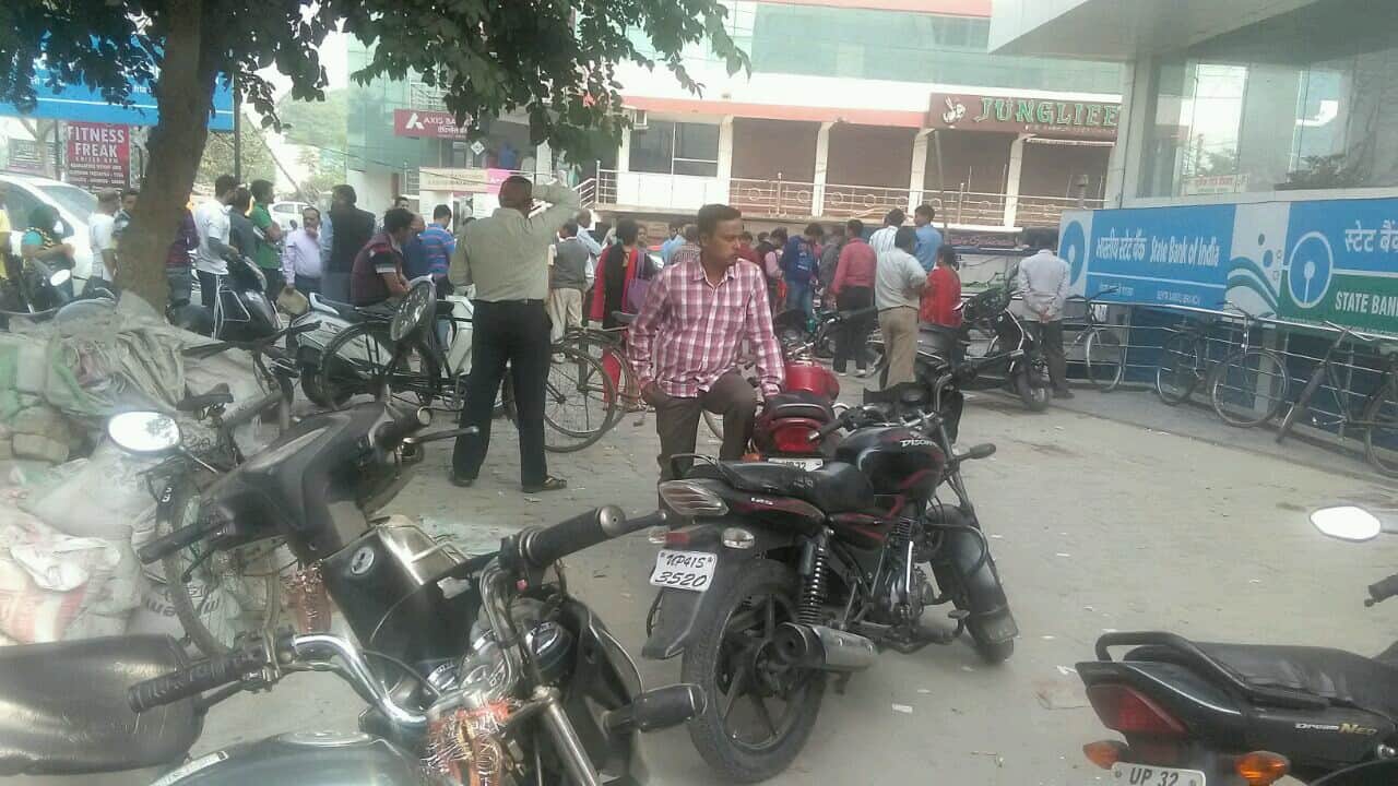 long queue opposite banks for currency exchange