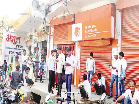 silence in market but long queues in bank
