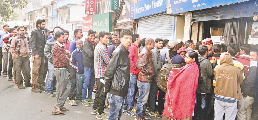 Long queues at banks, ATMs continue in Himachal