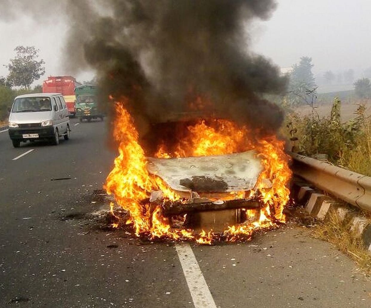 rewari news, running, car, fire, two people, injured