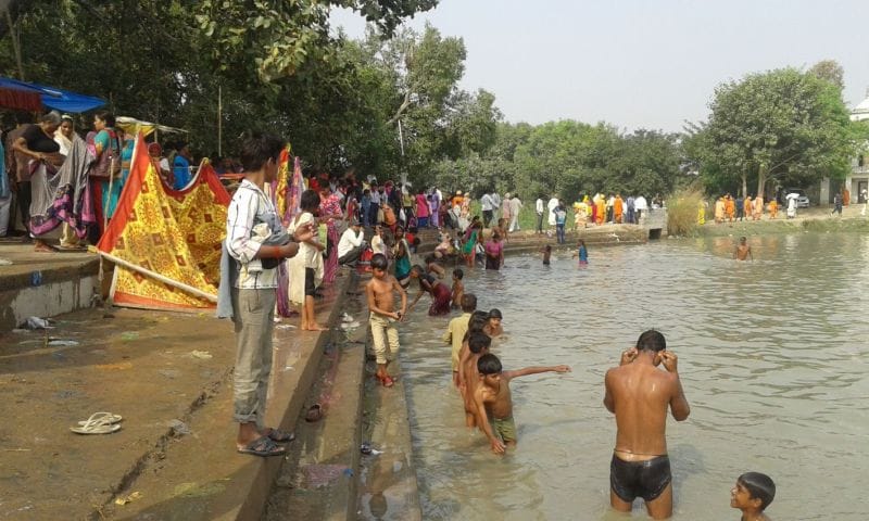 Devotees took a dip in the pool