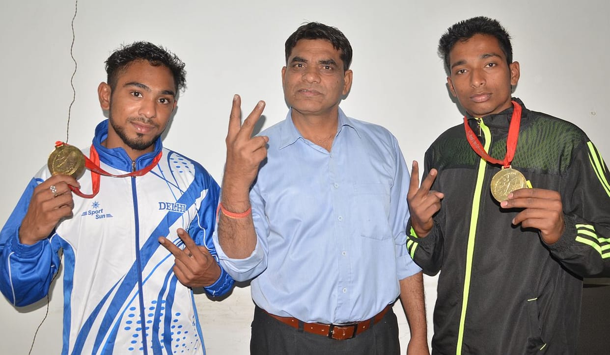 two players in the sports competition Hapur buried flag
