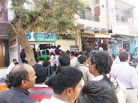 ATM lines flashed up the road