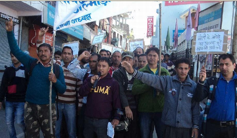 Water Institute procession pulled by contract workers