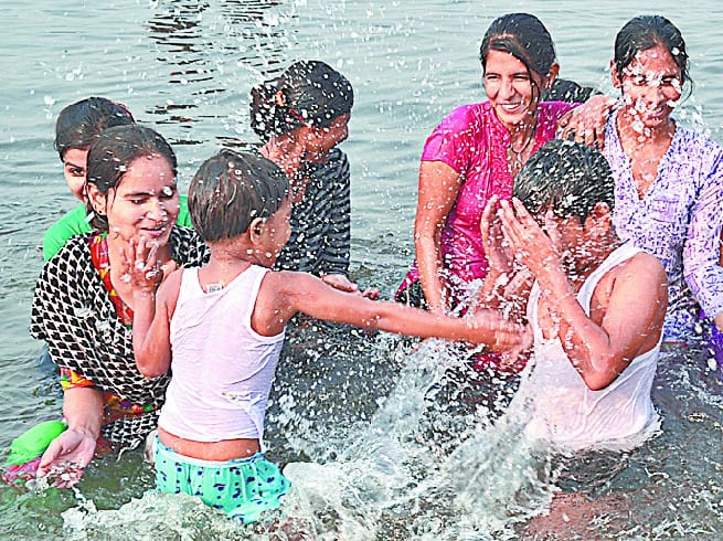 Has placed thousands of devotees take a dip in the Yamuna