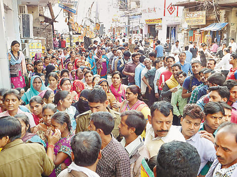 Kaymganj flashed lines outside banks in the dawn