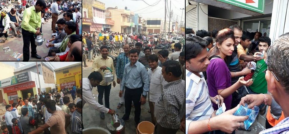 Demonetization: bjp workers and social worker providing refreshments for people in bank atm queues