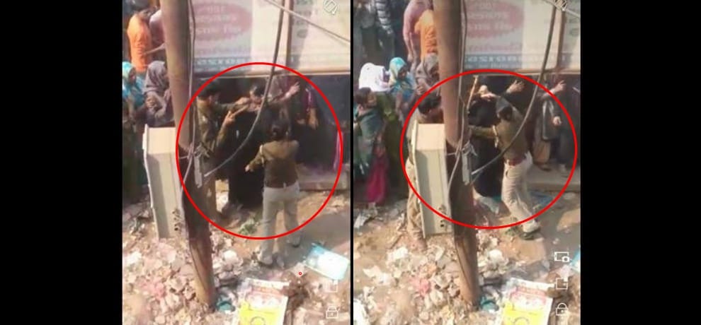 demonetization: woman breaks long bank line policeman beats him badly