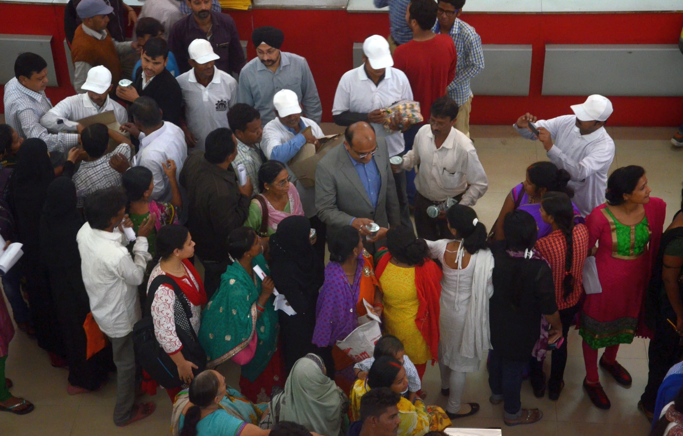 tea and snacks distribution to people outside banks