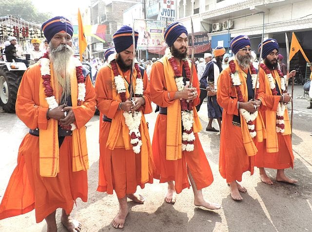 Dressed gurdwara, ragi batches corresponding to the Nihal
