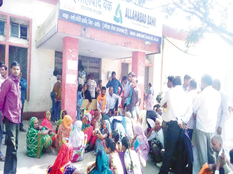 For the seventh consecutive day, hungry and thirsty people stood in line for hours
