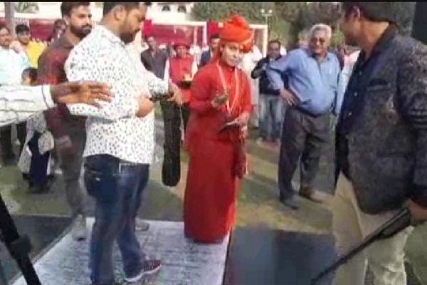 sadhvi fired in marriage ceremony in karnal haryana, 1 death