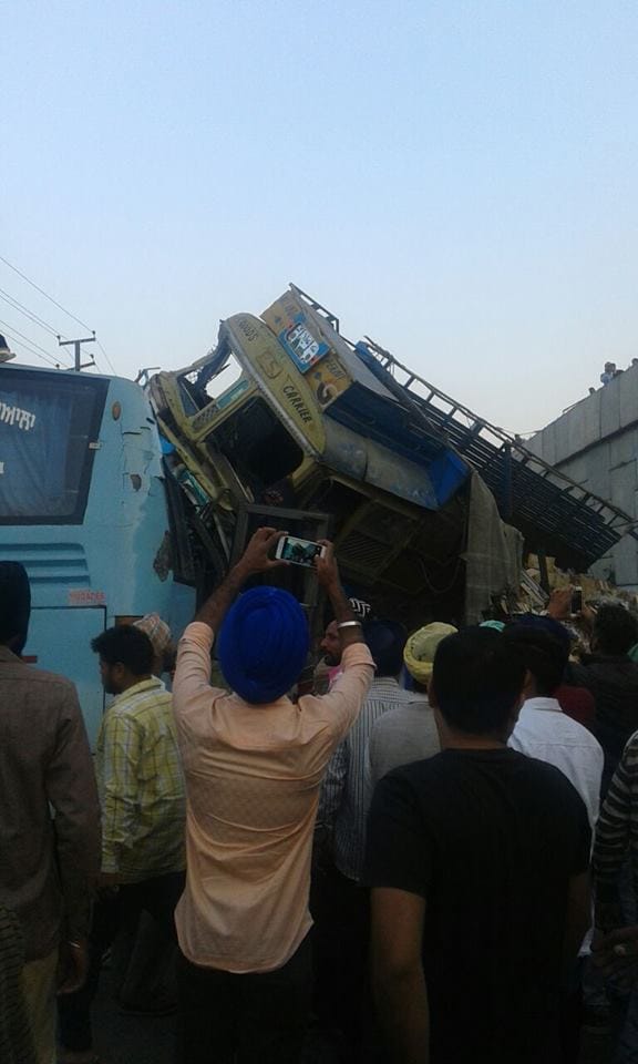 loaded truck fall on bus from flyover in khanna punjab