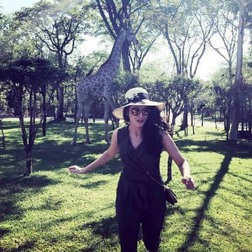 mandana karimi doing swimming in victoria waterfall