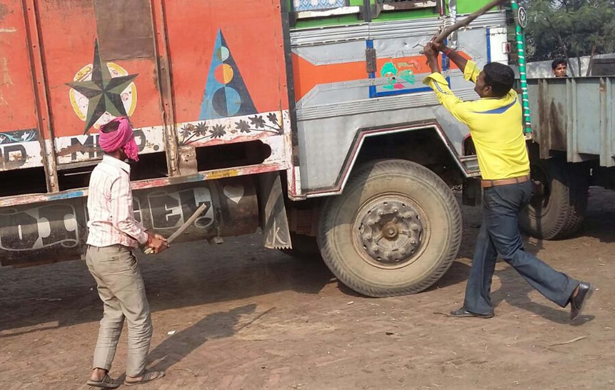 Bajaj get crushed by the truck, killing a cleaner