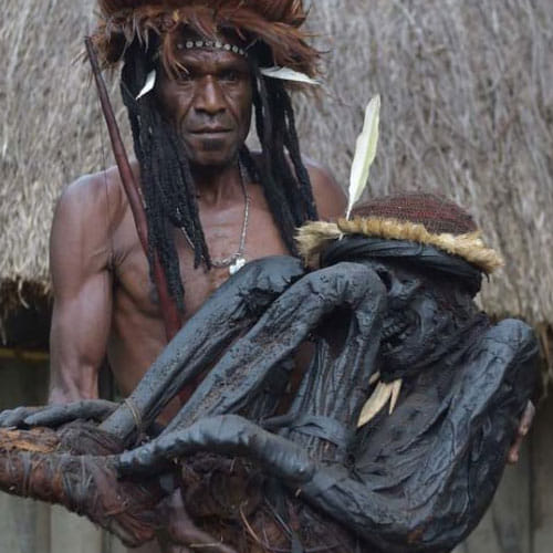Dani Tribe In Papua New Guninea Smokes Their Dead People To Preserve