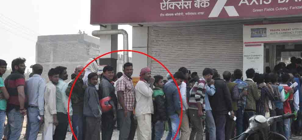 daily labours earning from standing in que before atm and banks