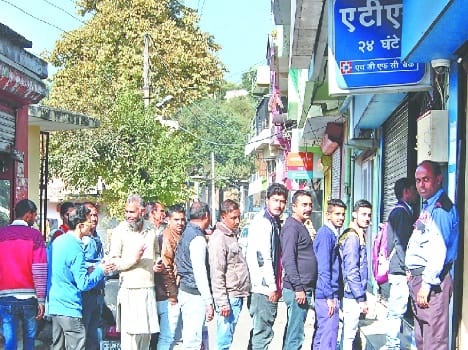 long que in front of atm in bilaspur
