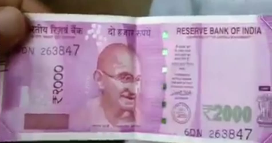 follow the tips and identify 2000 rupee fake or real note