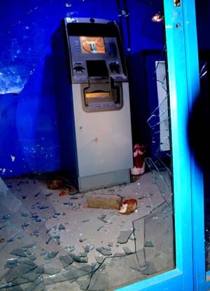 Angry students smashed two ATMs, looting shops