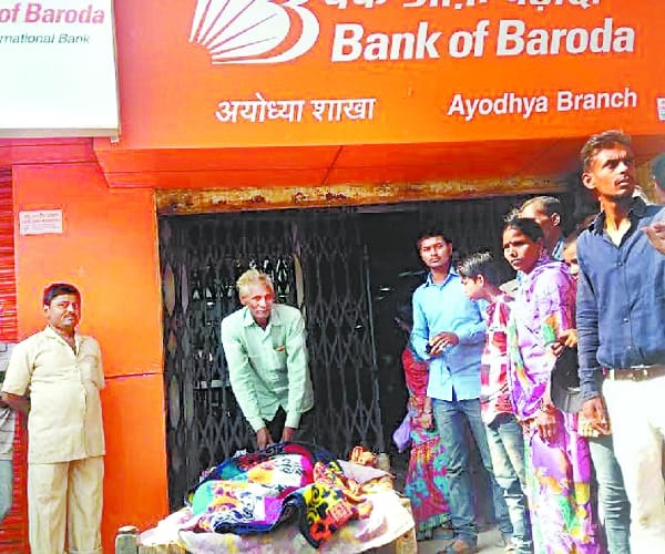 An old lady goes to take money from bank on cot.