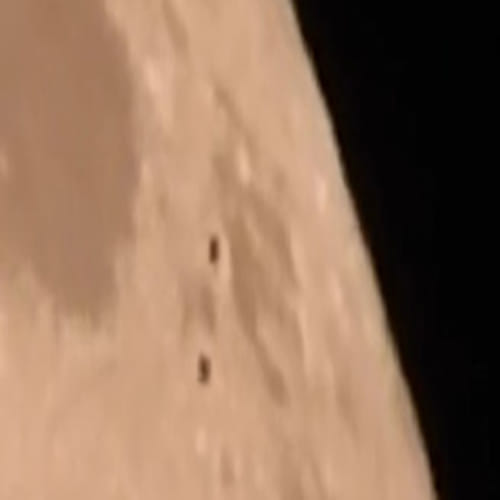  aliens flying over the moon
