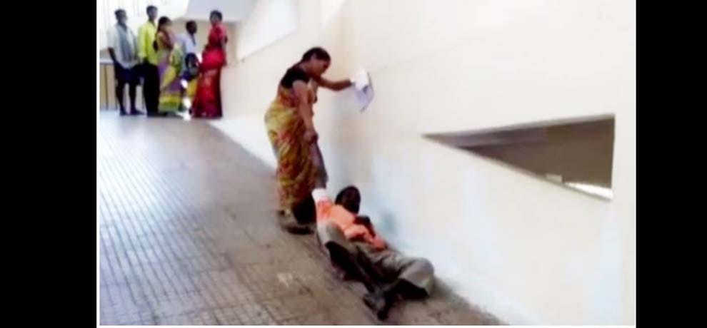 woman dragged husband to ramp when strecher not given to him in govt hospital of Andra 