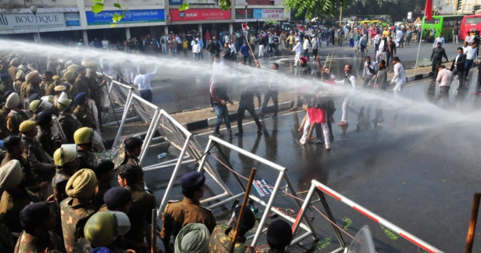 congress workers protest against amit shah in chandigarh, police use water canon to stop them
