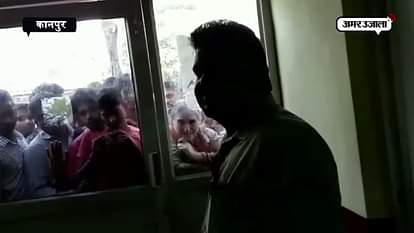 NOTE BAN: STUDENTS FORCED TO STAND IN BANK ATM QUEUE 