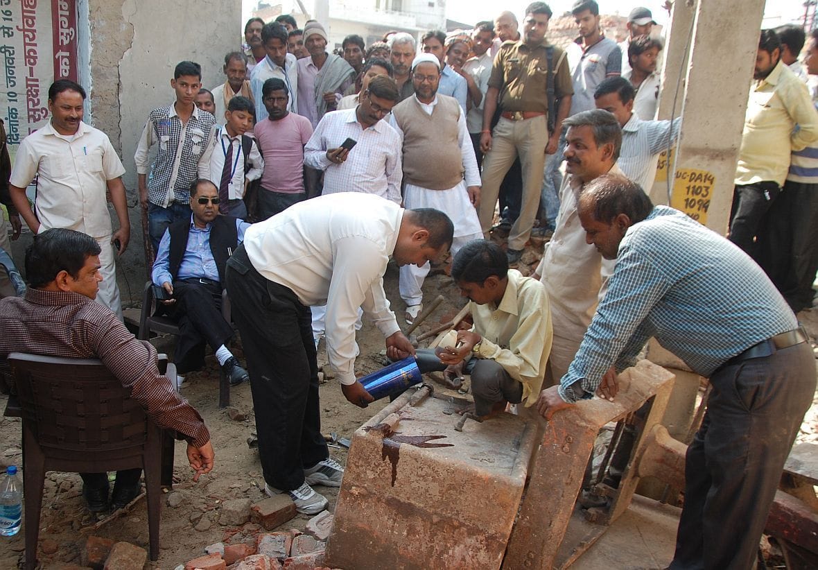 Subhash Tirahe carving out in the vault of the old tax office